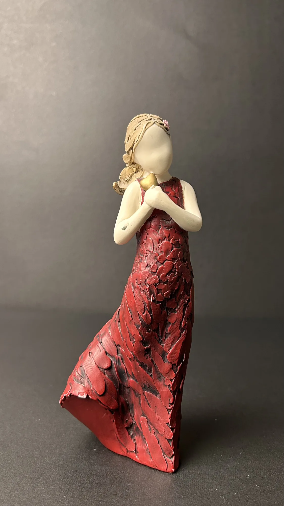 Decorative Resin Woman Figurine in Textured Red Dress Holding Heart