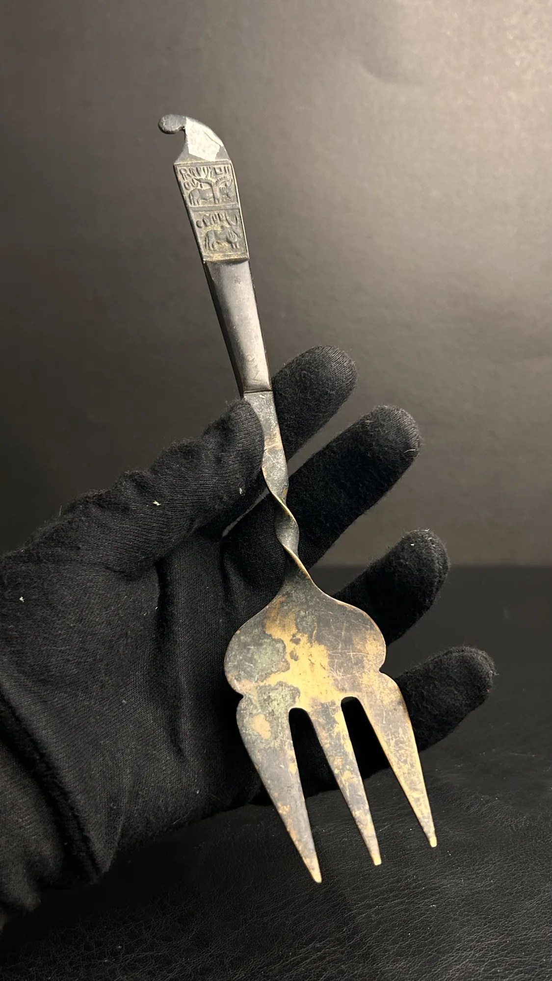 Vintage Decorative Metal Fork with Animal Relief Handle