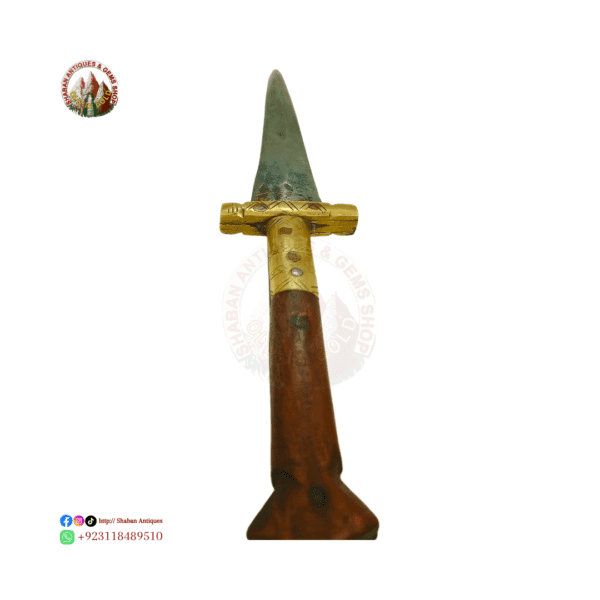 Wooden handle with brass details on an antique Pash Kabz dagger.