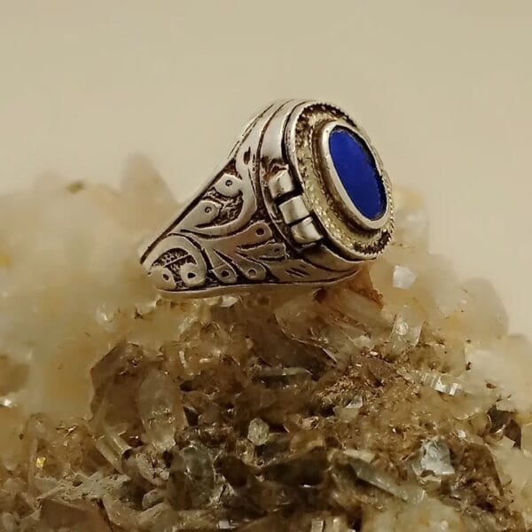 Silver ring with Lapis Lazuli stone on white crystals