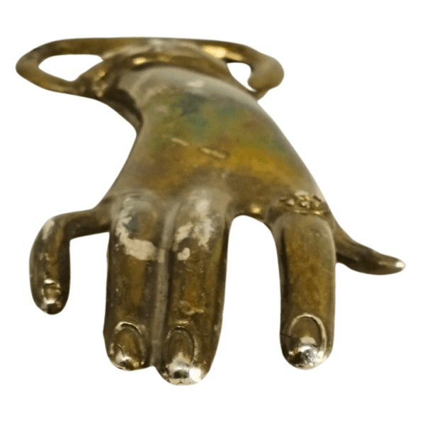 Brass hand bottle opener with antique finish