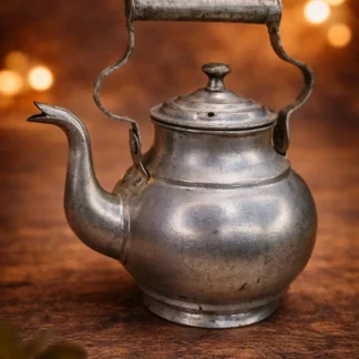 Vintage metal teapot decor with traditional handcrafted design