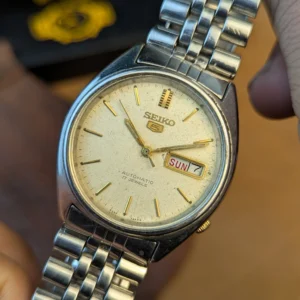 Seiko 5 Vintage Automatic 7009-876A cream dial with gold hour markers and day-date display