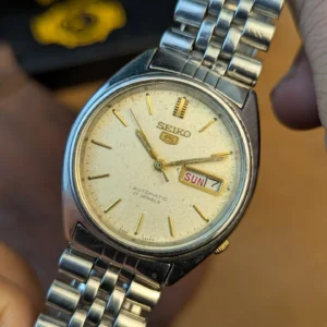 Seiko 5 Vintage Automatic 7009-876A cream dial with gold hour markers and day-date display