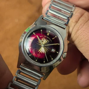 West End Watch Co vintage manual wind watch red sunburst dial Swiss made