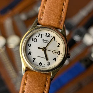 casio quartz ladies watch white dial vintage design close up
