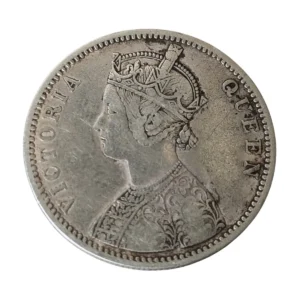 Front side of antique Queen Victoria British India silver rupee coin with royal portrait.