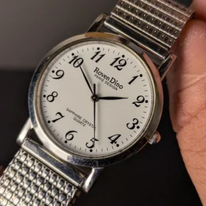 Silver expandable strap wristwatch close-up