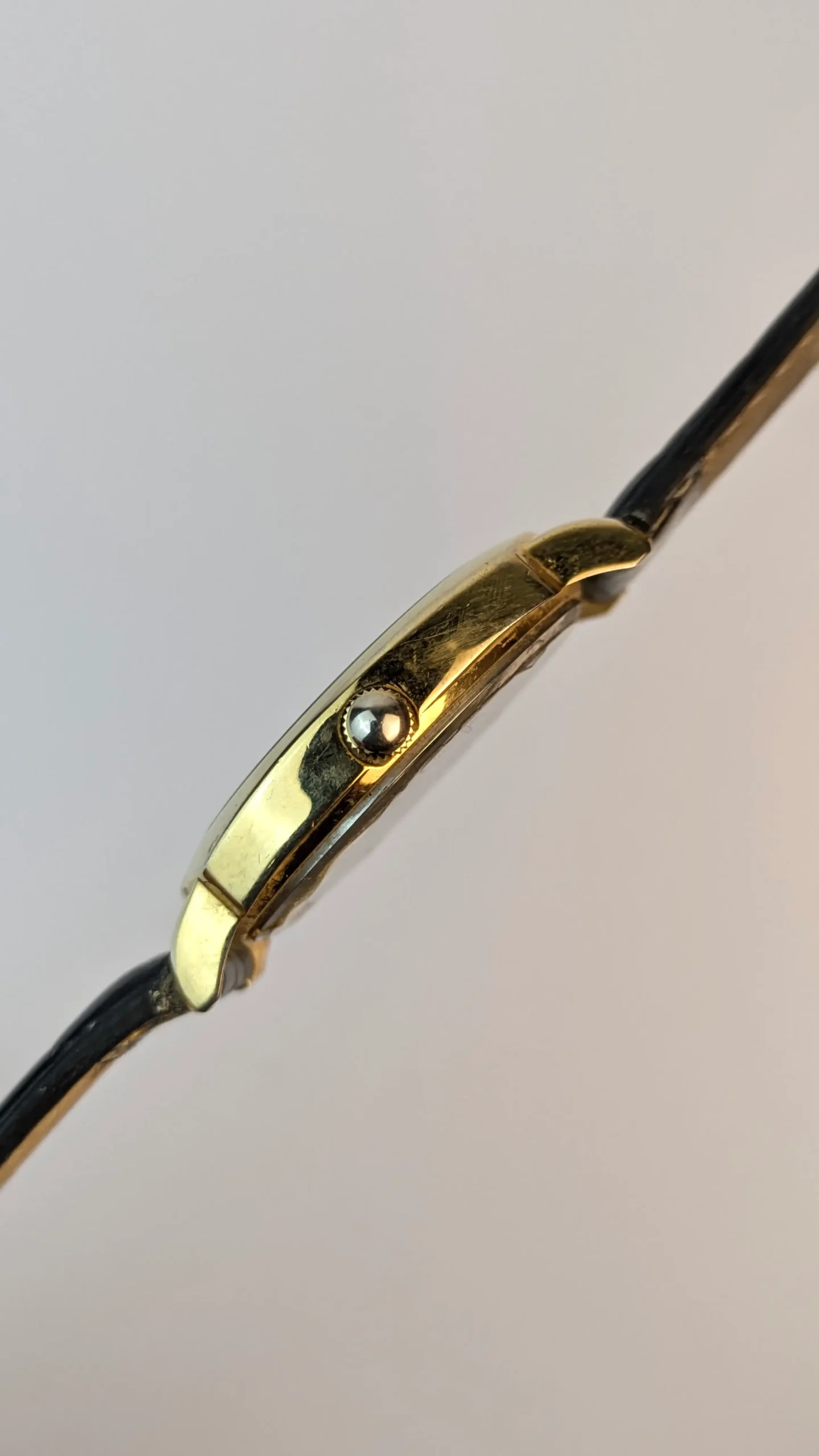Black leather strap vintage watch