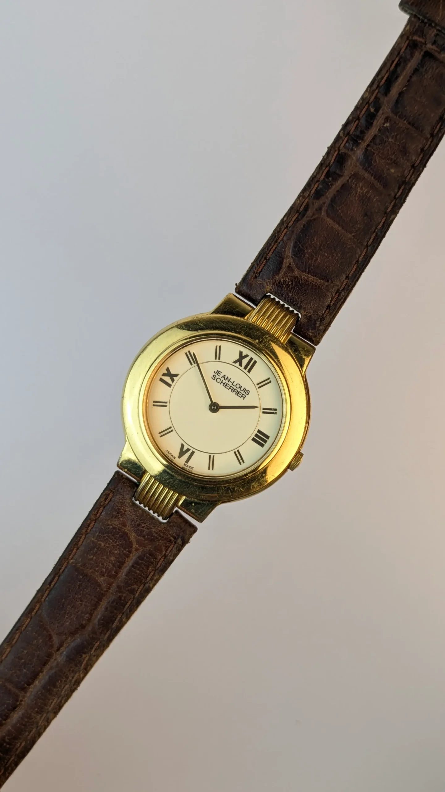 Close-up of Roman numeral dial vintage watch