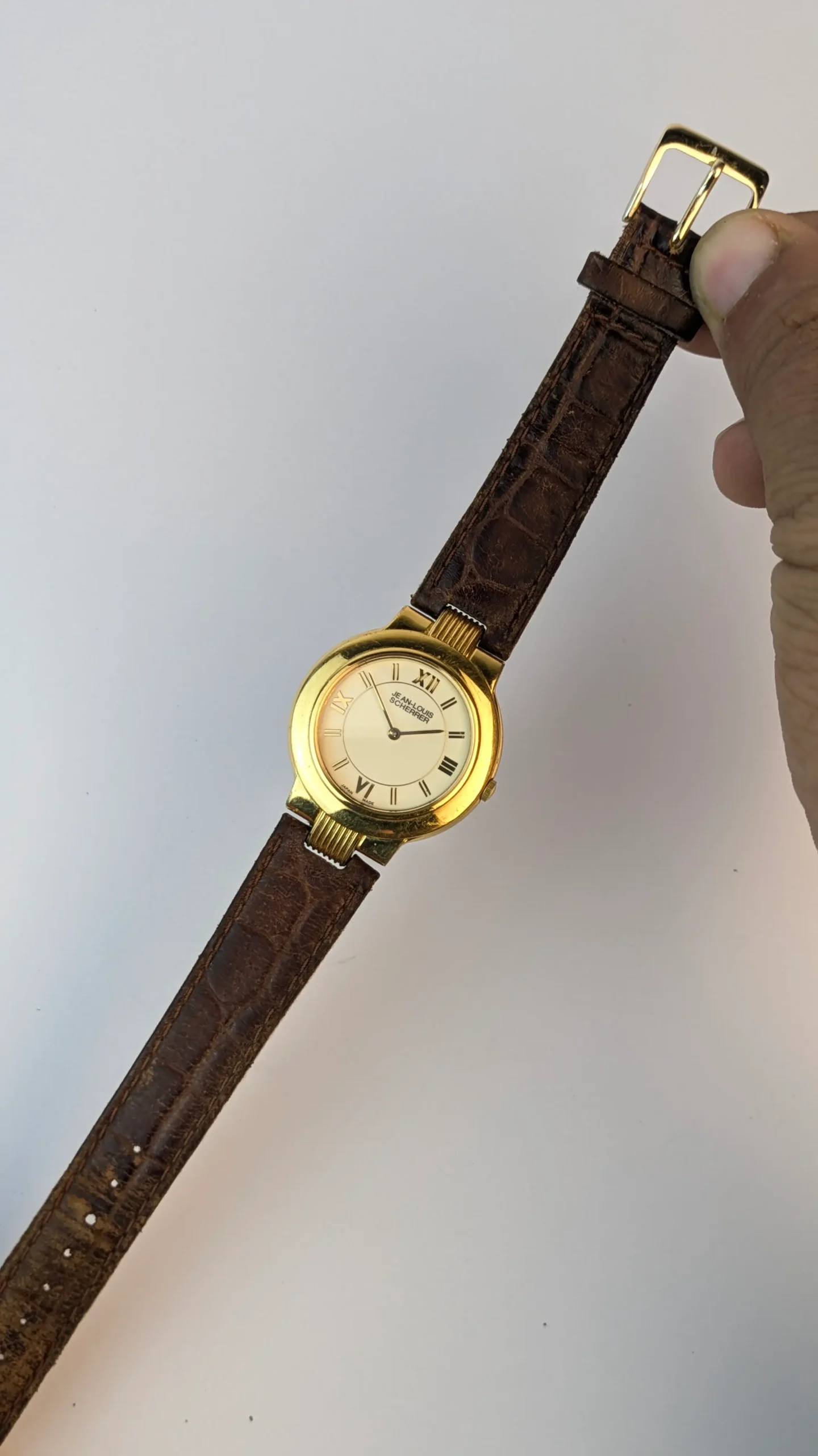 Full view of vintage leather strap wristwatch
