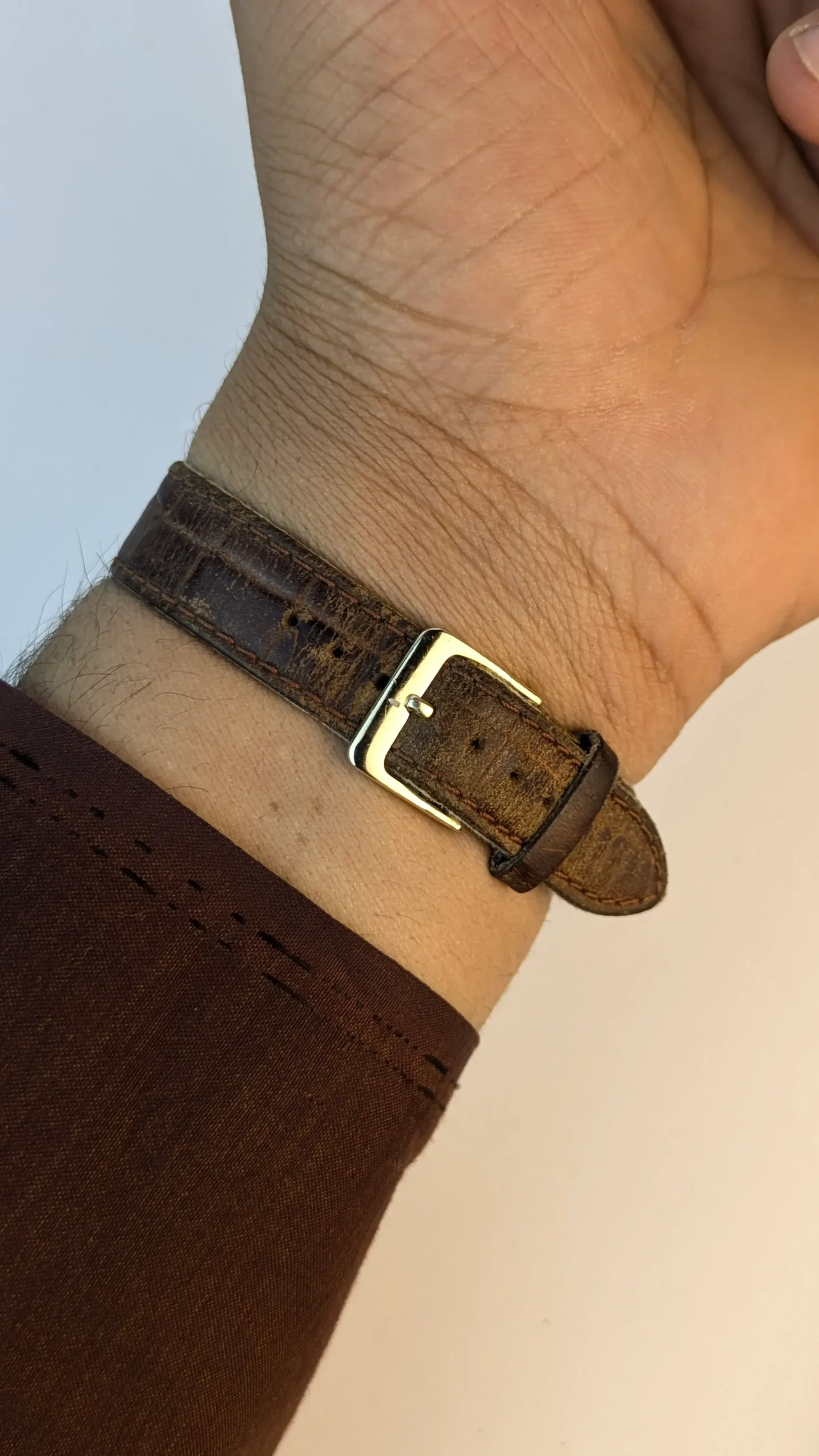Brown leather strap buckle detail watch photo