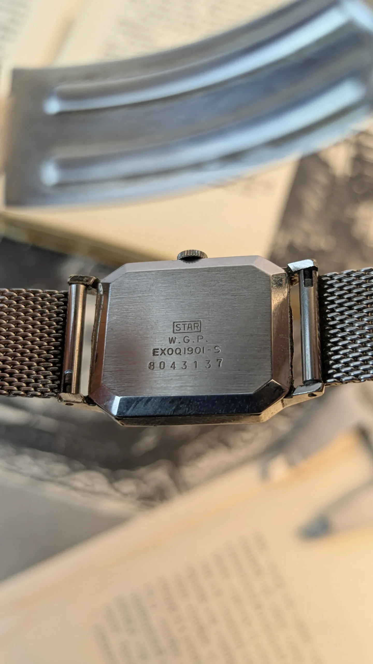 Back case of Citizen Playmate Swiss watch showing reference markings.