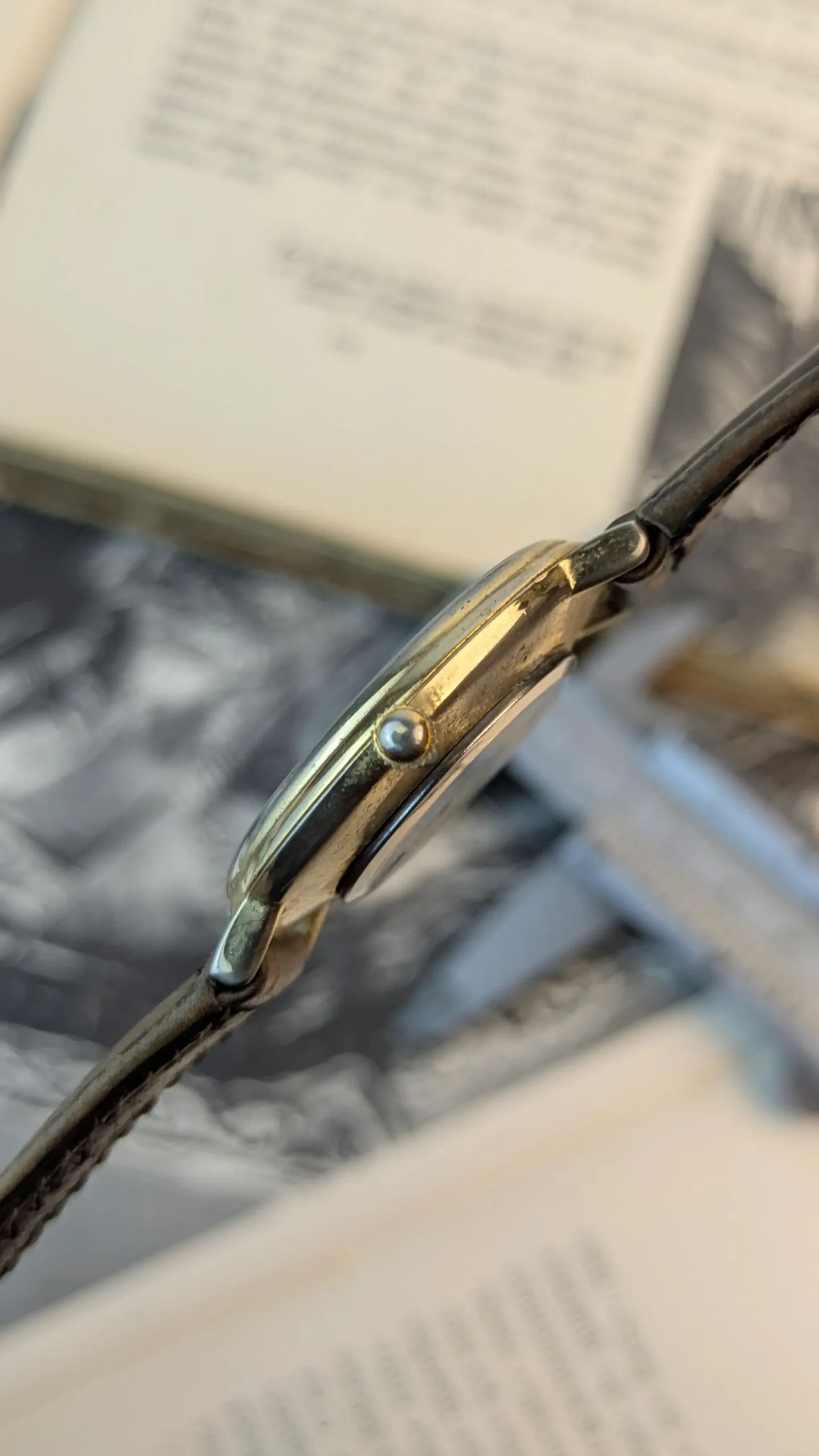 Crown side view of vintage Excellent quartz wristwatch.