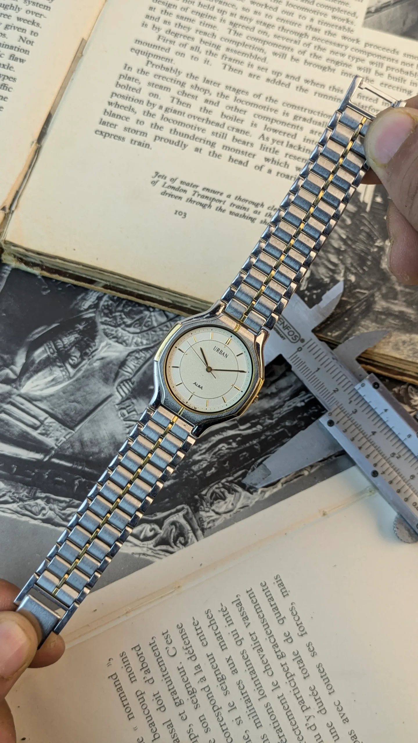 Vintage ALBA Urban watch with silver dial and two-tone bracelet.