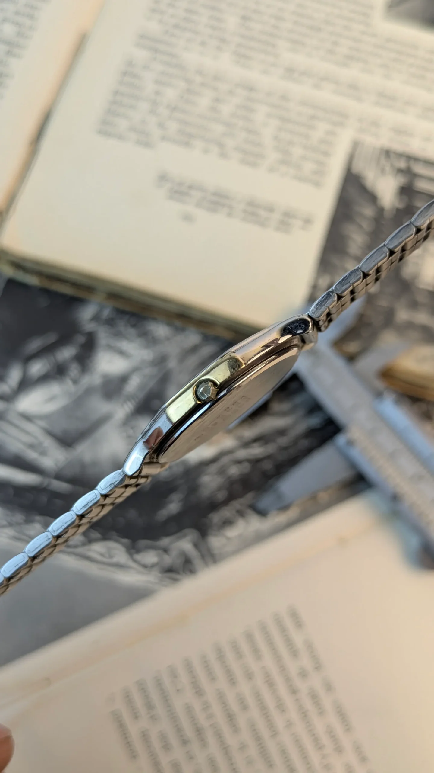 Crown side view of vintage ALBA Urban quartz watch.
