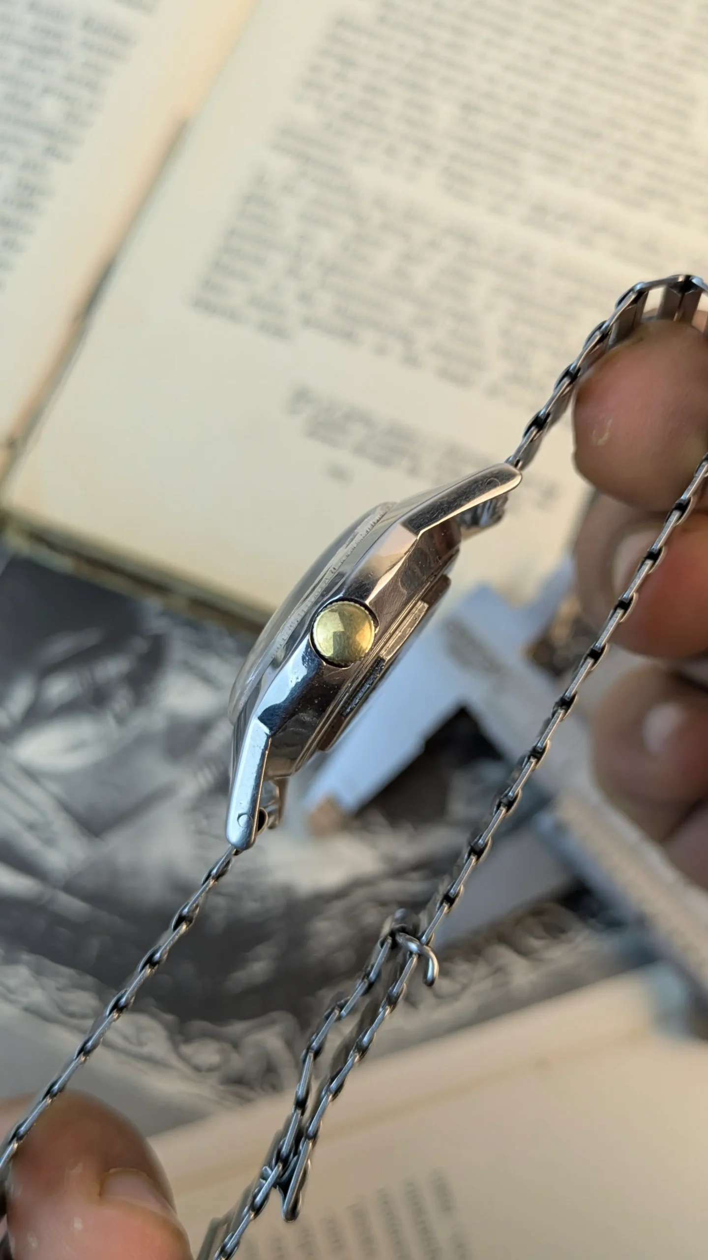 Crown Side profile of vintage West End Watch stainless steel case and bracelet.