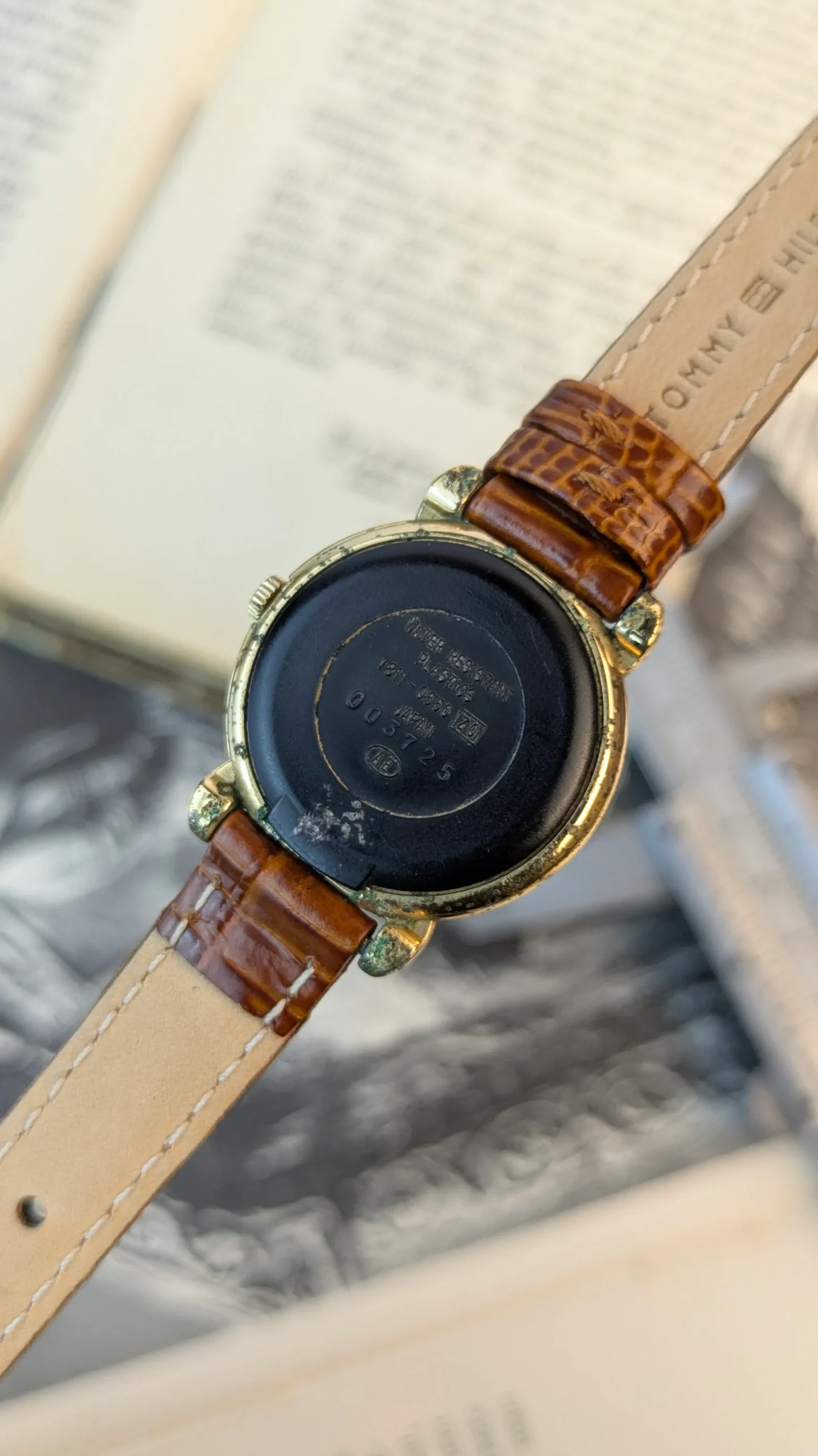 Back view of vintage ALBA ladies quartz watch with brown crocodile-pattern strap.