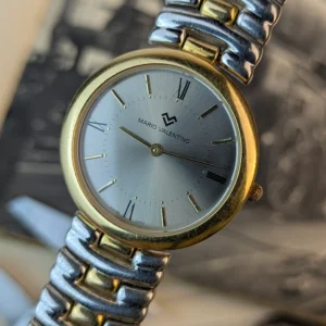Two-tone stainless steel Mario Valentino dress watch with expansion bracelet.