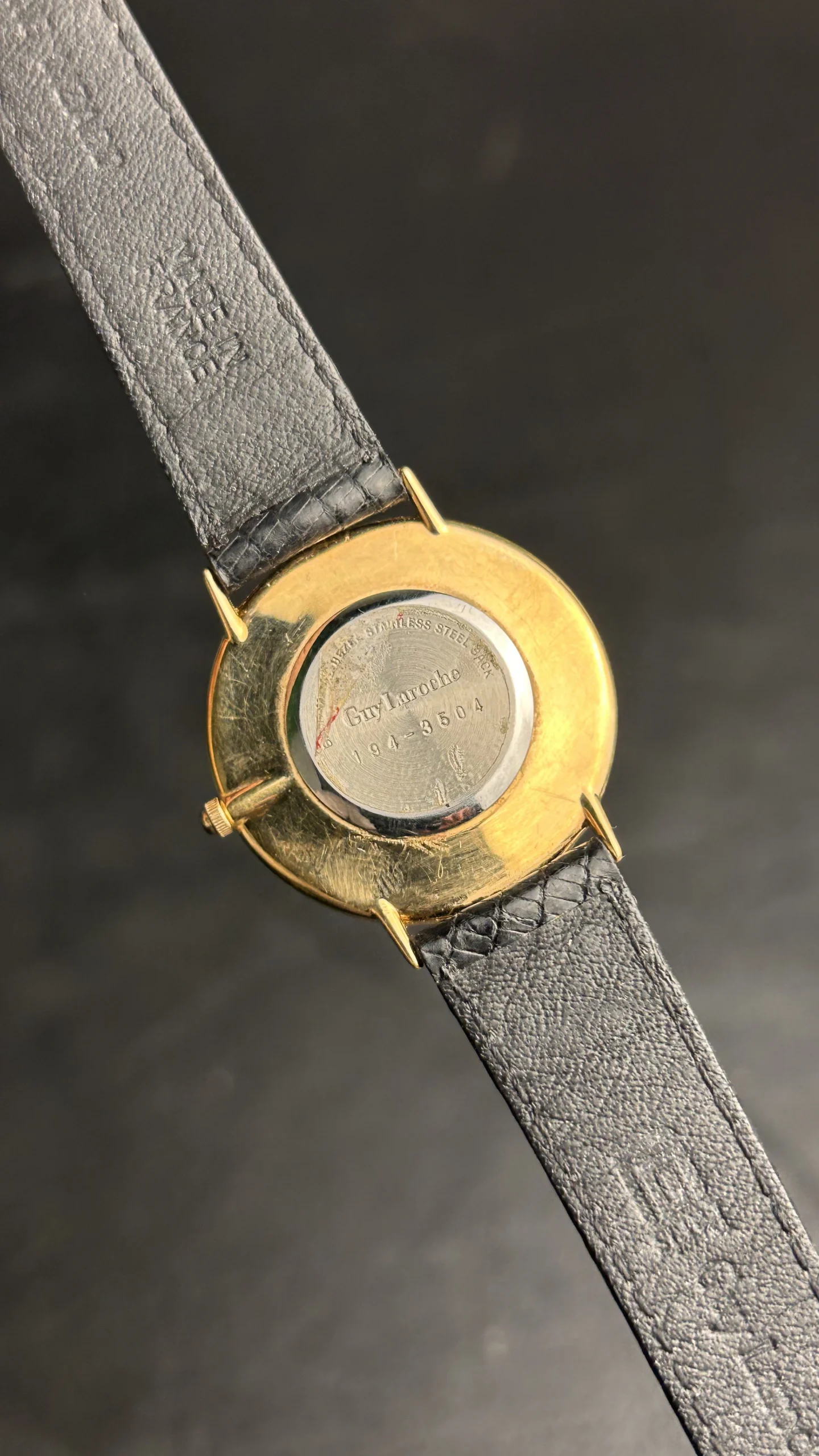 Vintage Guy Laroche Swiss Quartz Watch – Gold Tone White Dial Black Leather Strap - Image 2