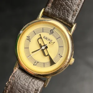 Vintage Krone Musical Trumpet Quartz Watch – Gold Tone Novelty Dial Brown Leather Strap
